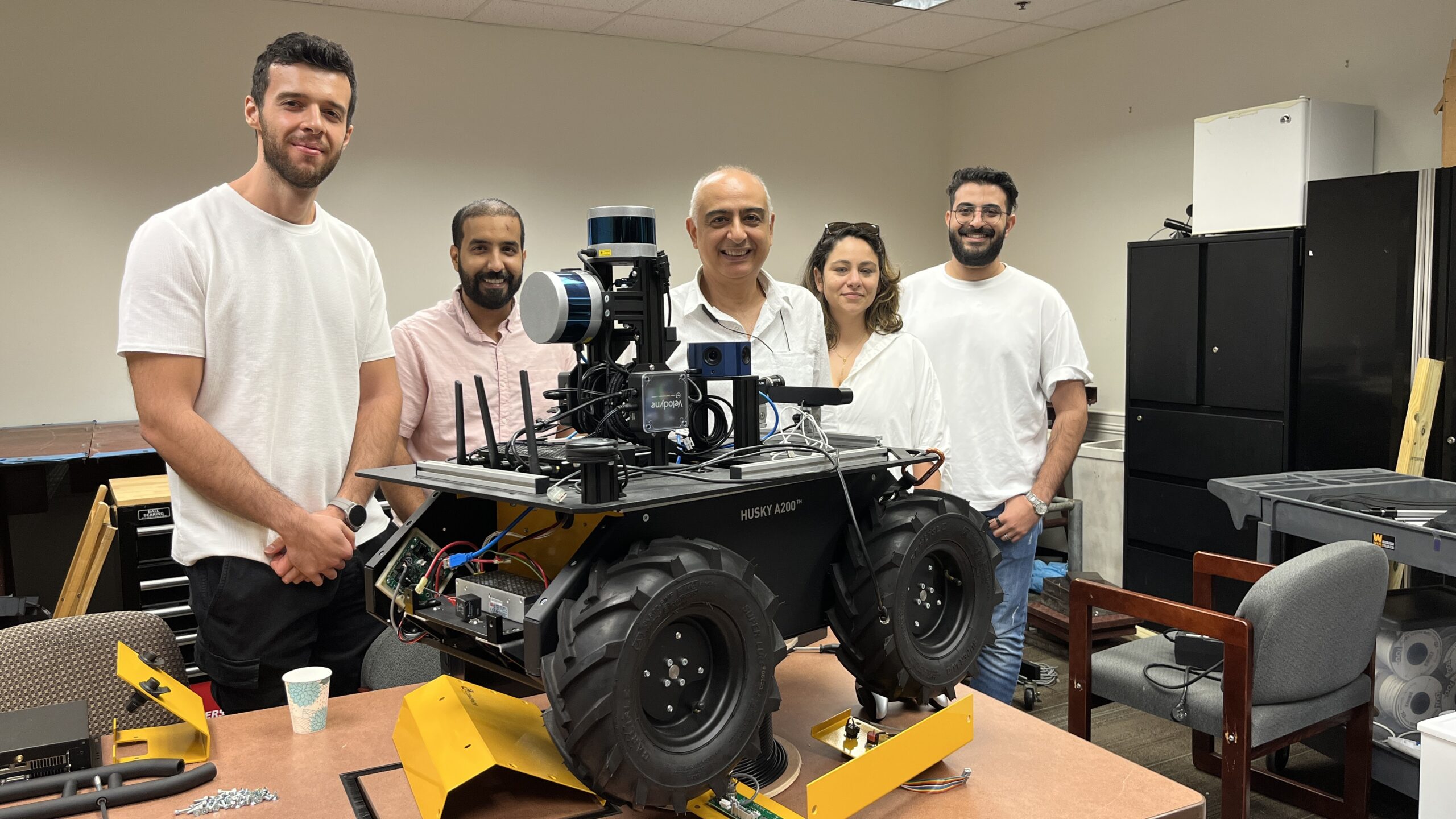 Necati Catbas and students in his lab