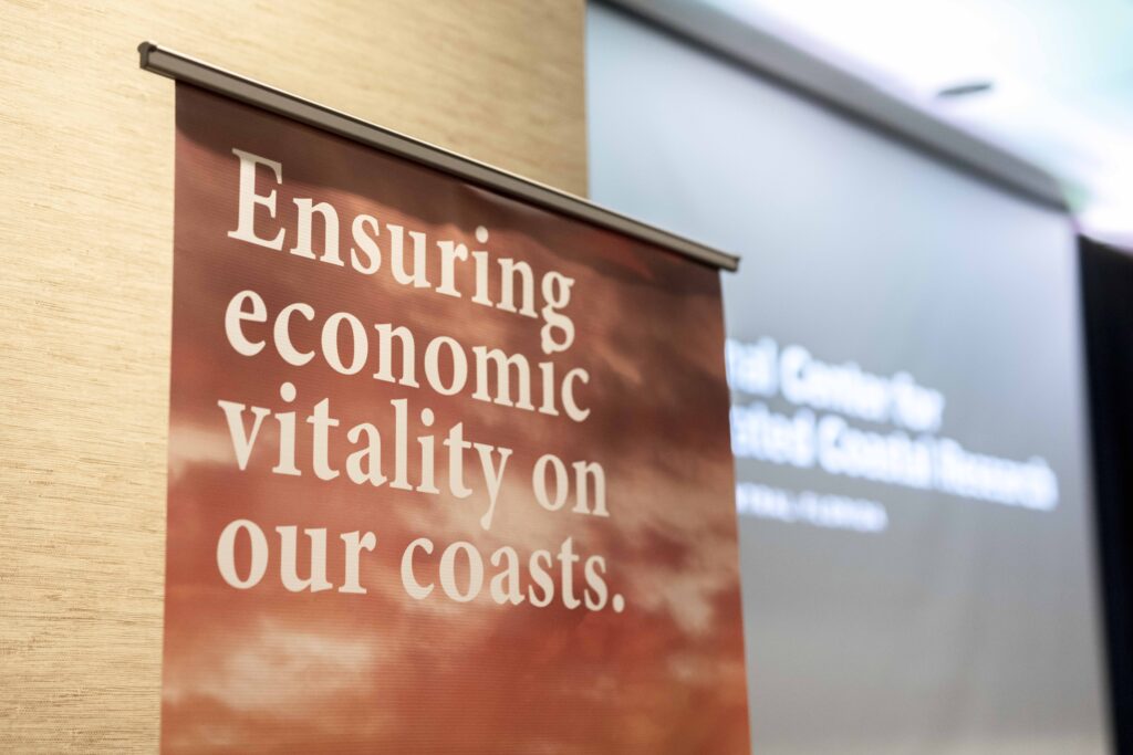 Banner that says "ensuring economic vitality on our coasts"