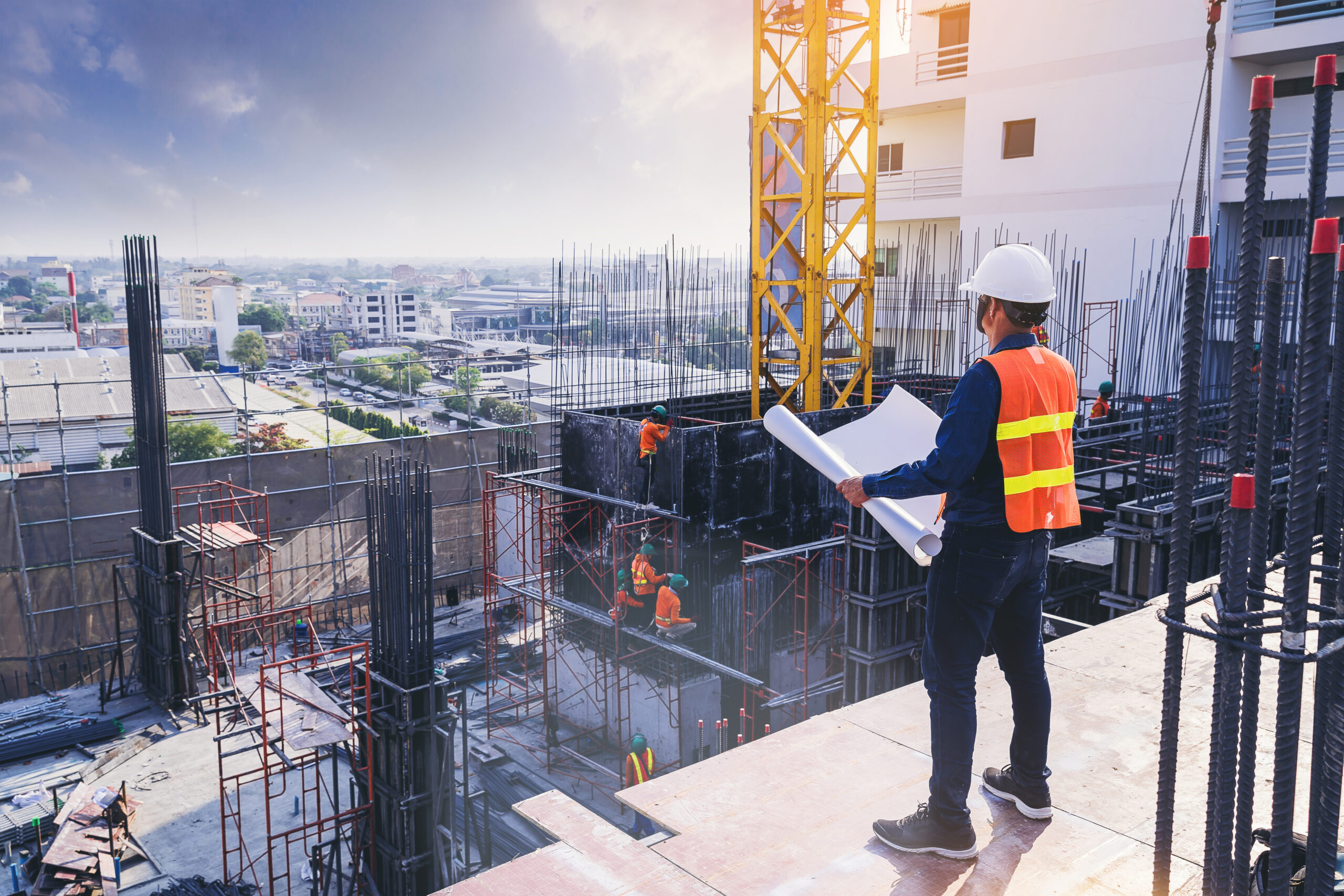 engineer looks at construction site