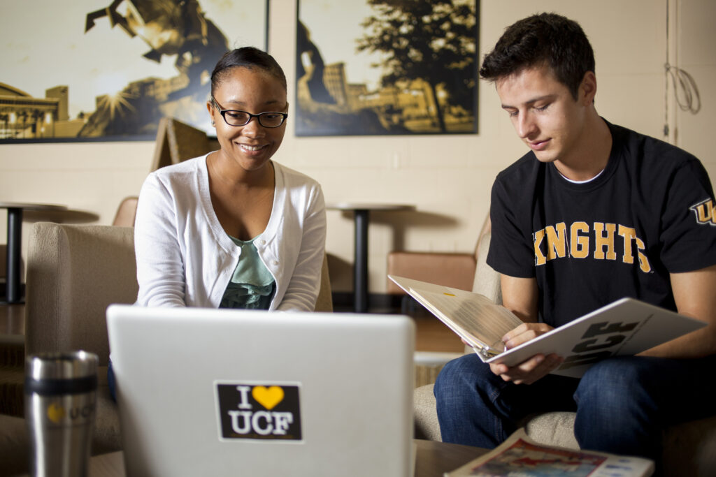 Students in front of laptop